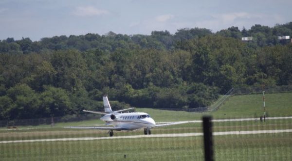 large plane landing at Lunken Airport