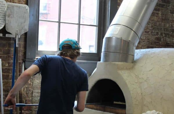 Wood-fired pizza oven at Fireside Pizza