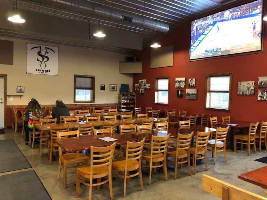 Taproom with large TV at Sons of Toil