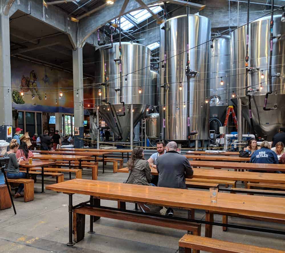 People seated at the Rhinegeist taproom