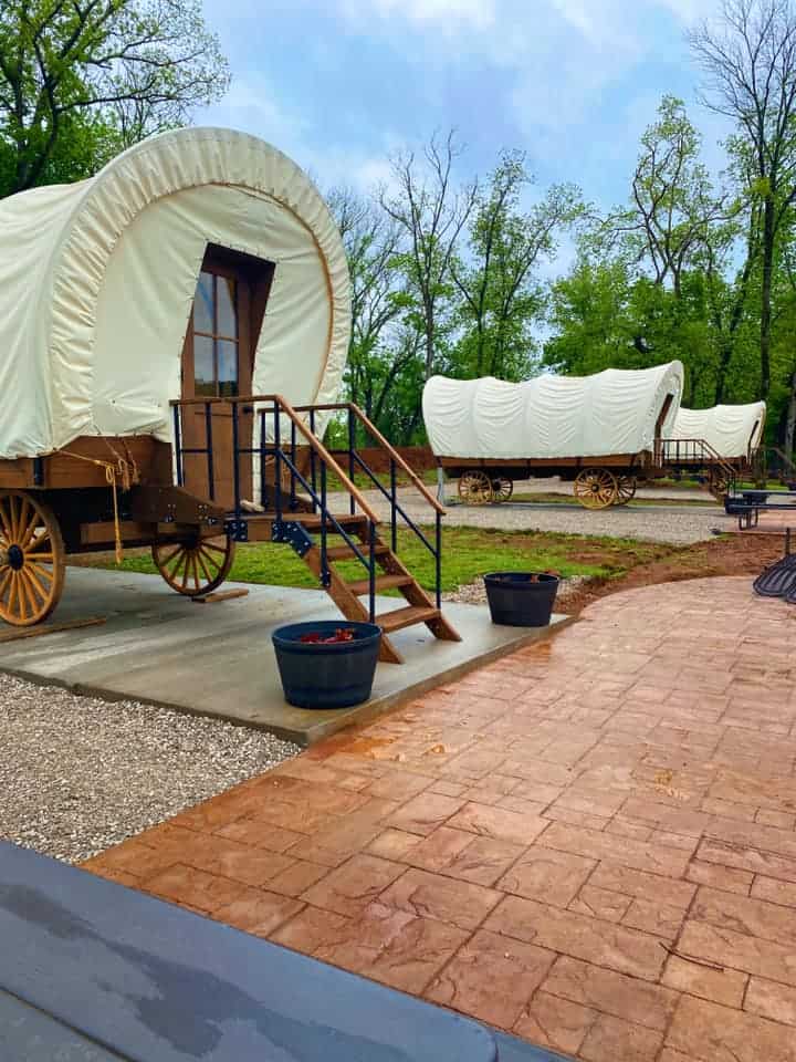 a row of covered wagons for rent near Mammoth Cave in Kentucky
