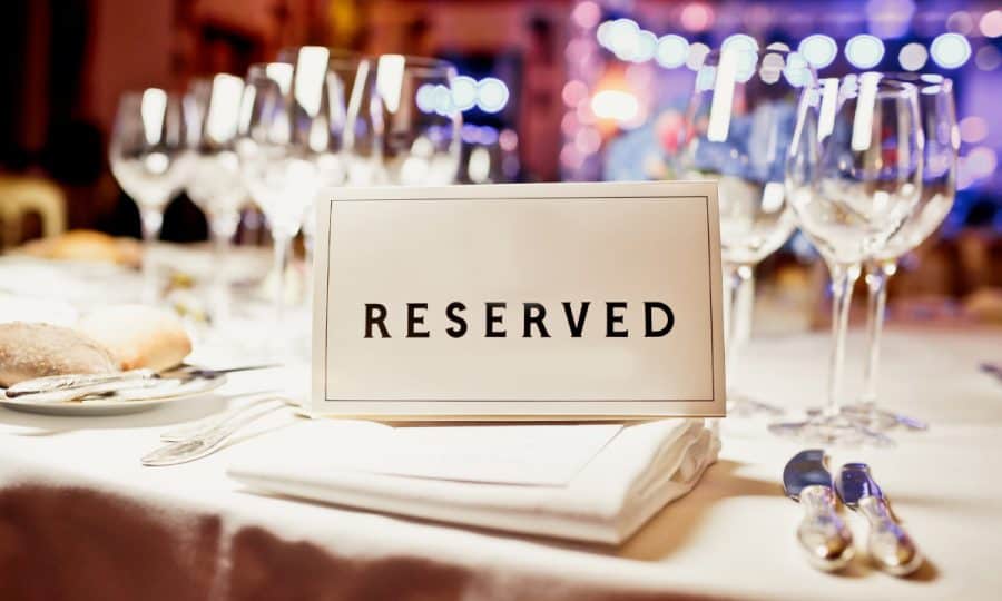Restaurant table with reserved sign for a private event
