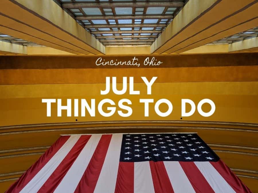 The lobby of Union Terminal with an American flag and a title of July Things to Do in Cincinnati overlaid
