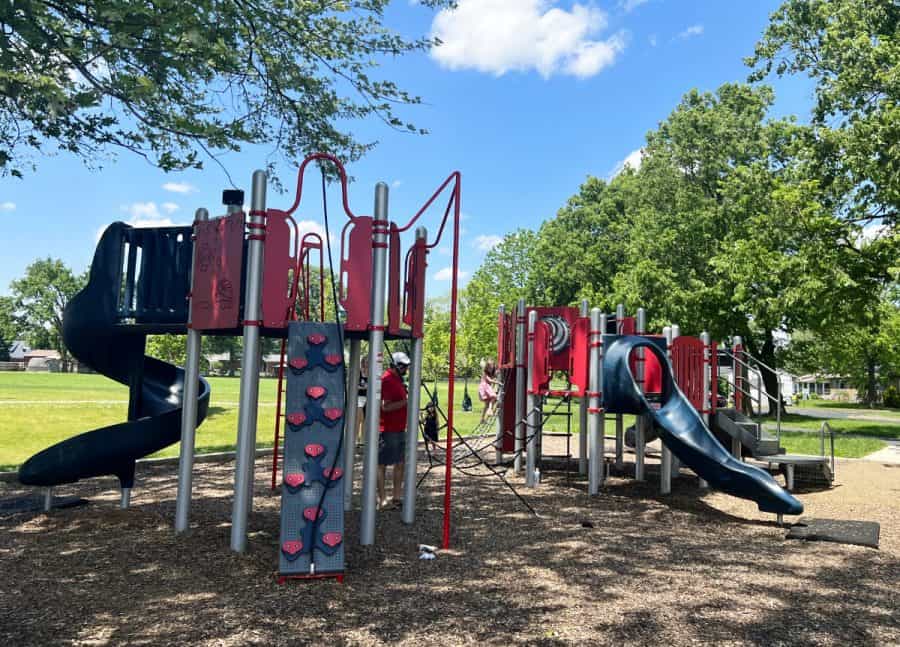 A family playing at the playground