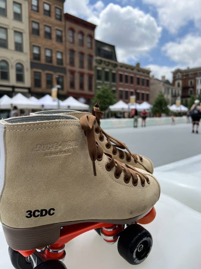 Roller skates sitting on the edge of the outdoor roller rink on Court Street