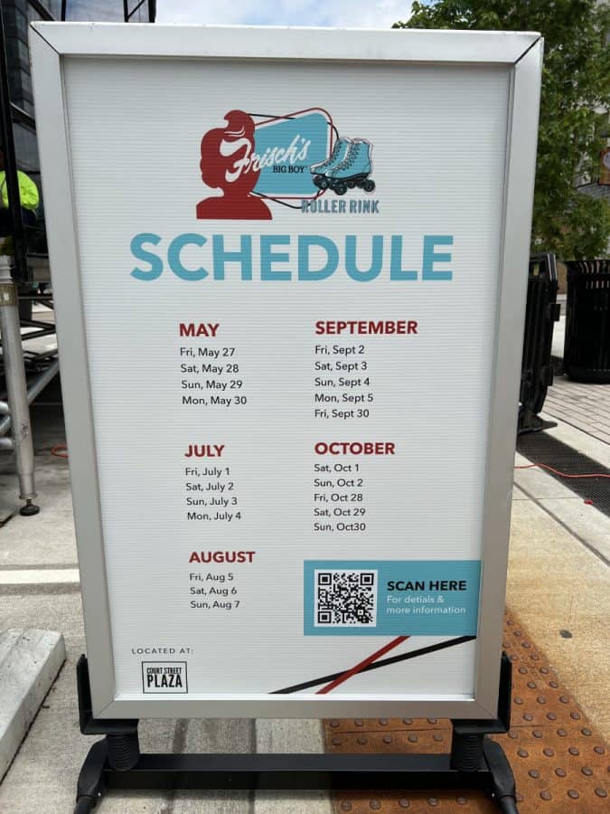 Sign showing the summer schedule for the downtown roller rink on Court Street Plaza