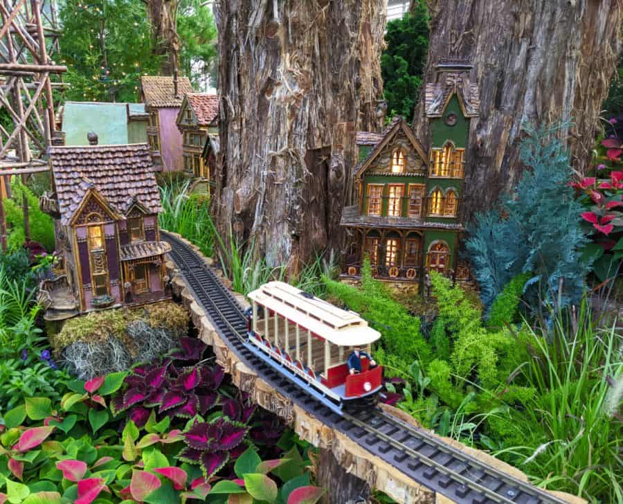 a train on the tracks at the holiday show at the Krohn Conservatory