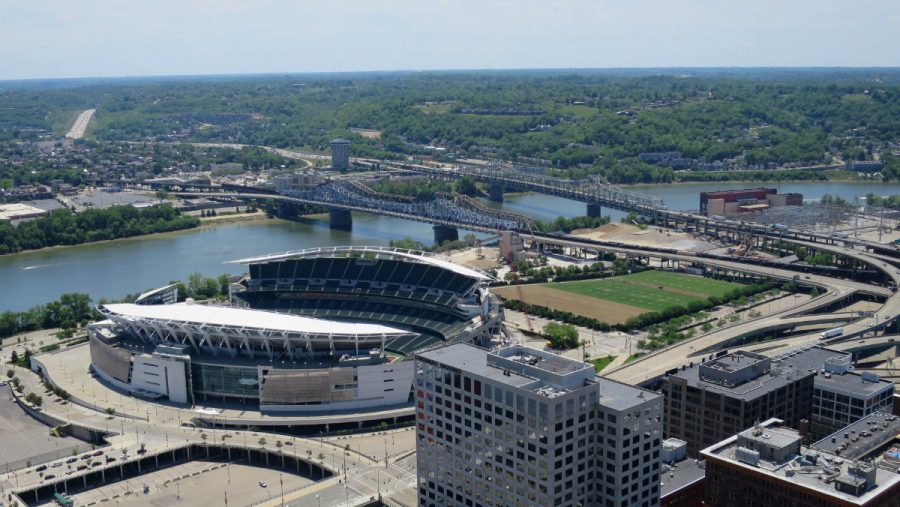 An overhead view of downtown Cincinnati featuring Paul Brown Stadium and the Bengals practice field, showing where the Bengals Training Camp will be held

