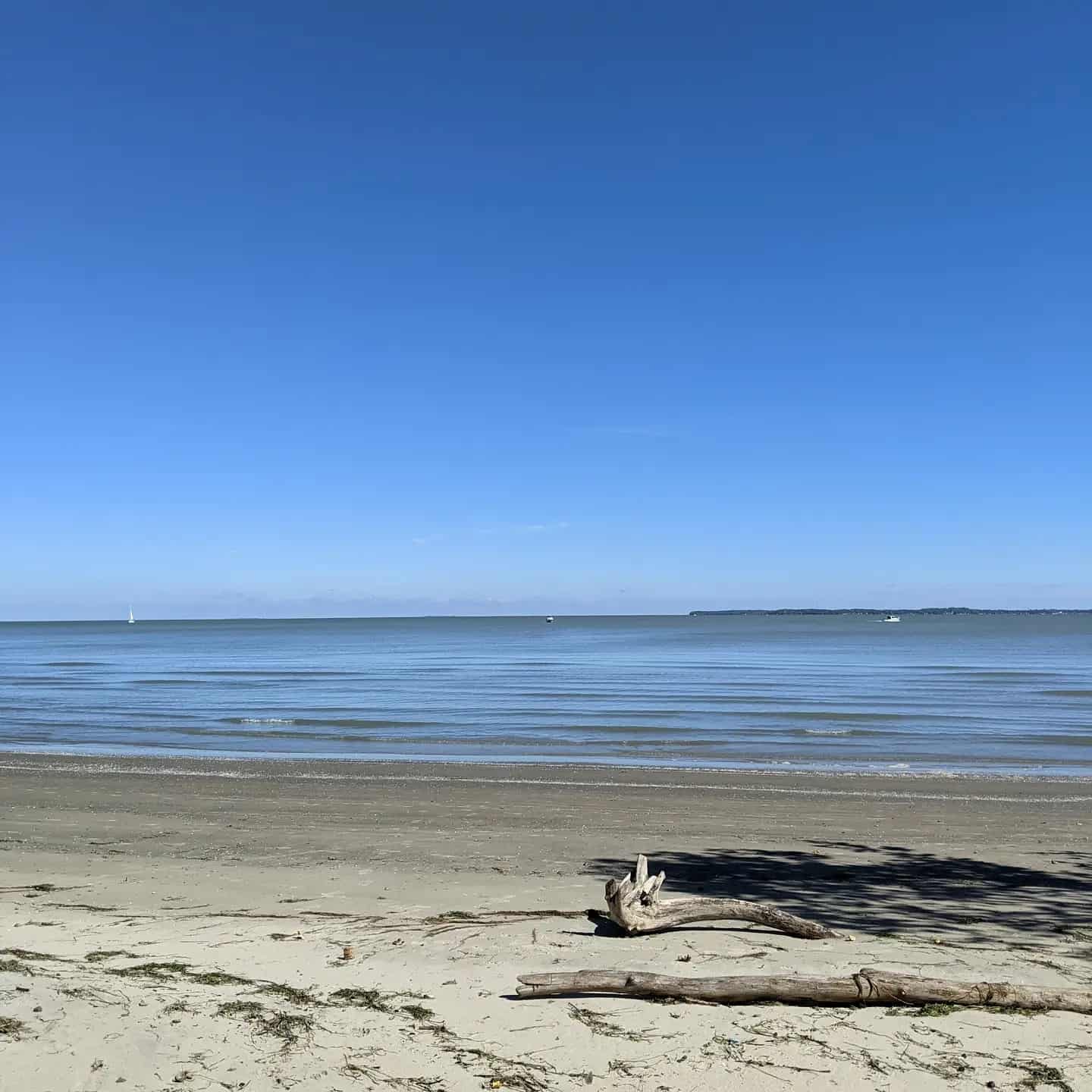 blue skies and sand at the East Harbor Beach in Ohio