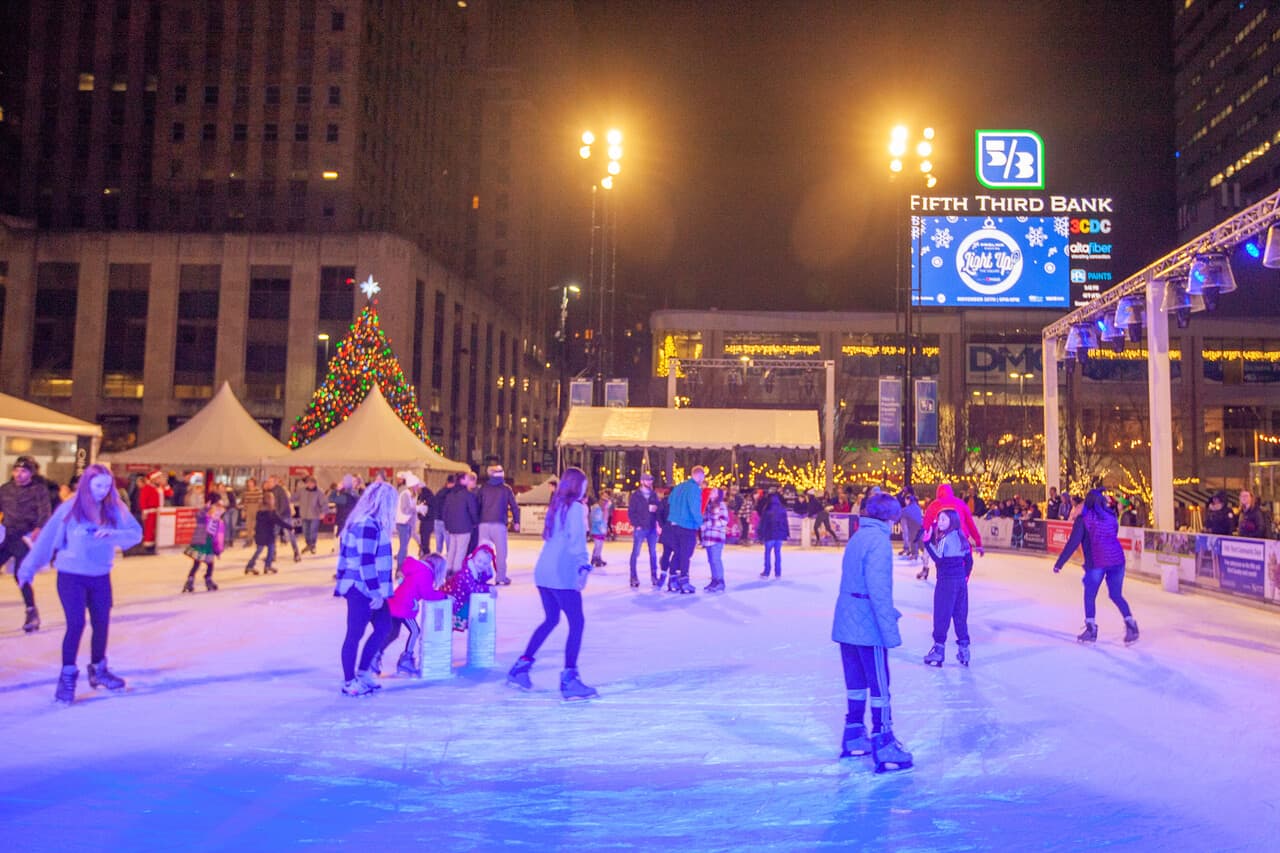 people ice skating on an outdoor rink at Fountain Square in Cincinnati