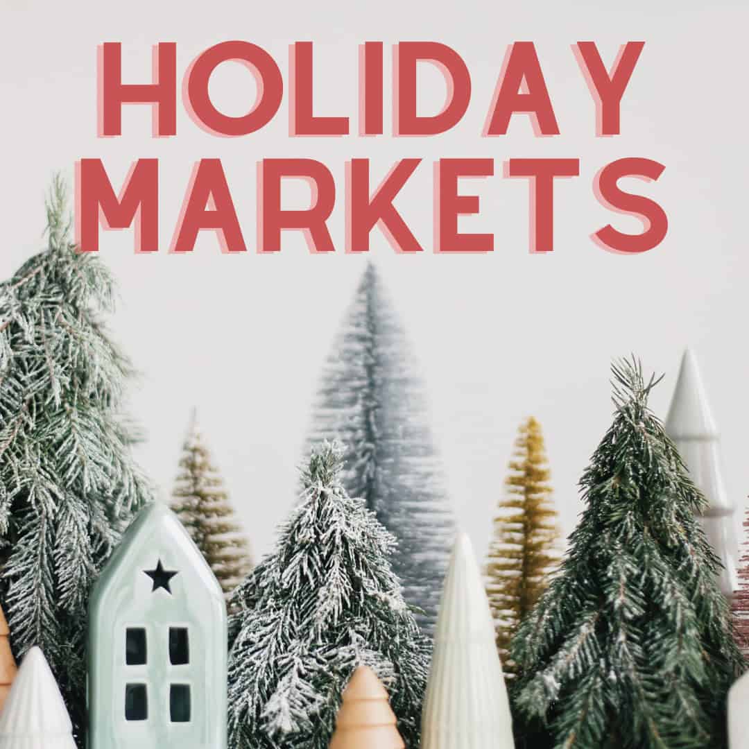 decorative houses and various trees as part of a Holiday Markets photo